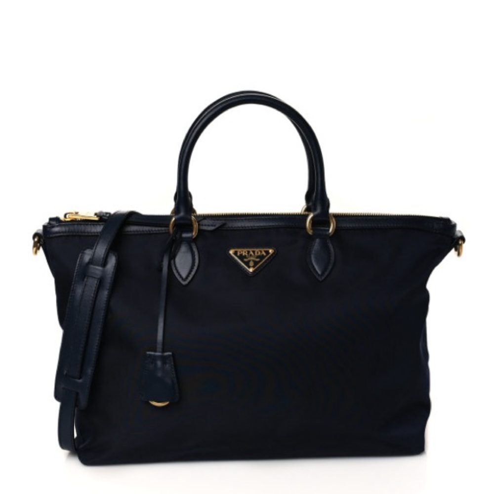 PRADA
Nylon Tessuto Soft Calf Tote Blue
Includes: Dust bag, strap, bag charm